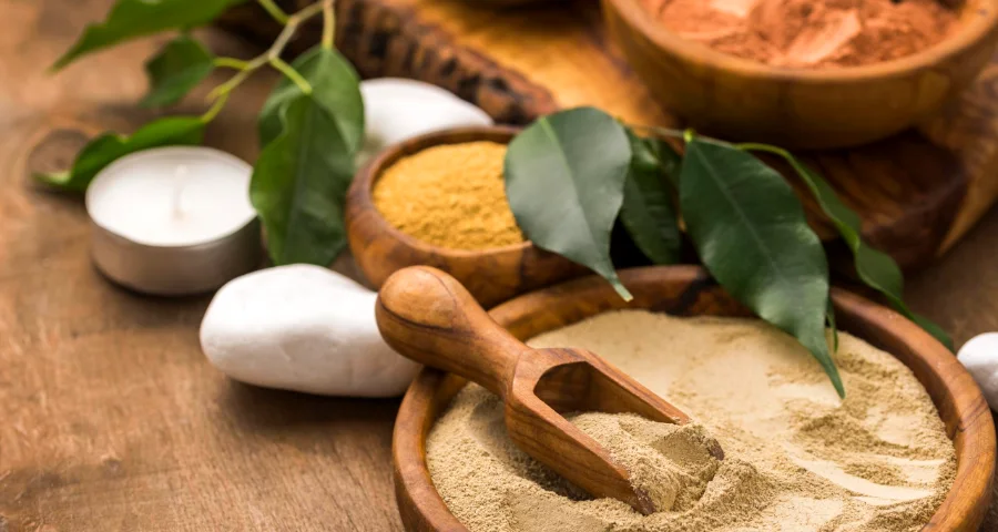 Ayurvedic herbal powders used in Udvartana for weight loss at Advait Ayurveda, Ahmedabad